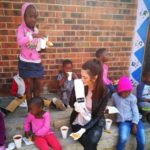 Miss SA Explains Why She Wore Gloves Whilst Dishing Out Food For Kids