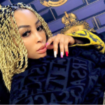 Ouch! Khanyi Mbau Responds To Her Hater Calling Her Fake